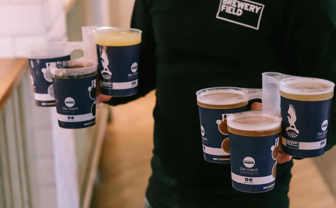 Stack-Cups being carried in one hand