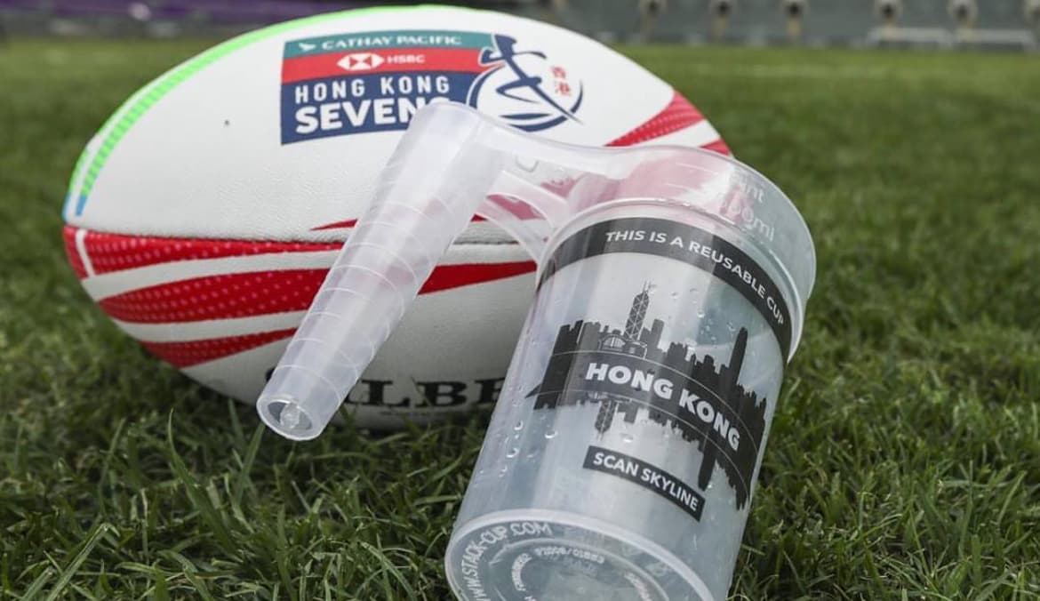 Branded cups with sponsor logos printed via In-Mould Labelling